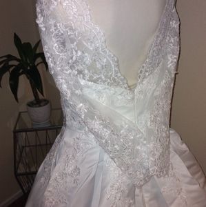 Wedding gown with court train and lace sleeves